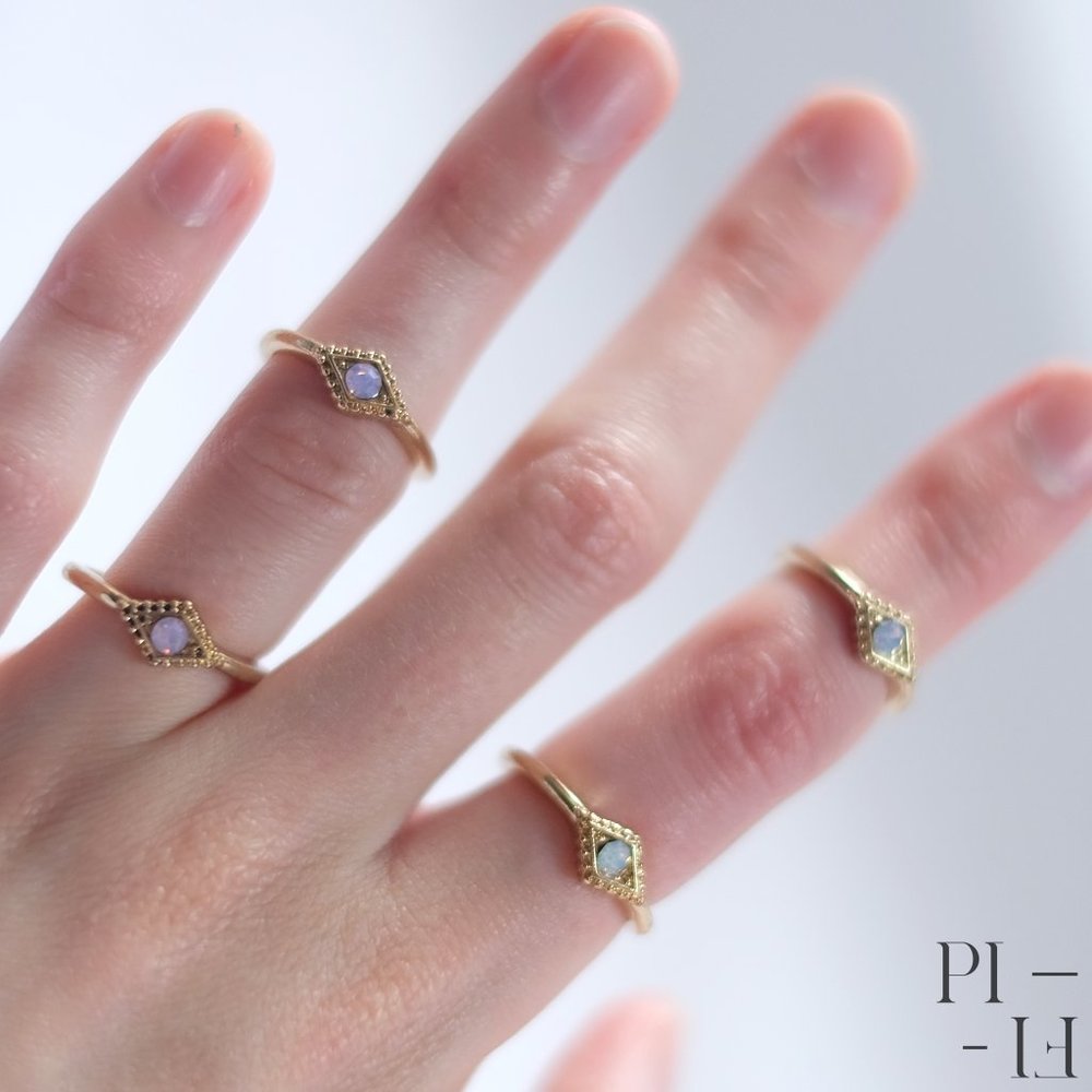 Set of Four stackable rings in baby pink and blue